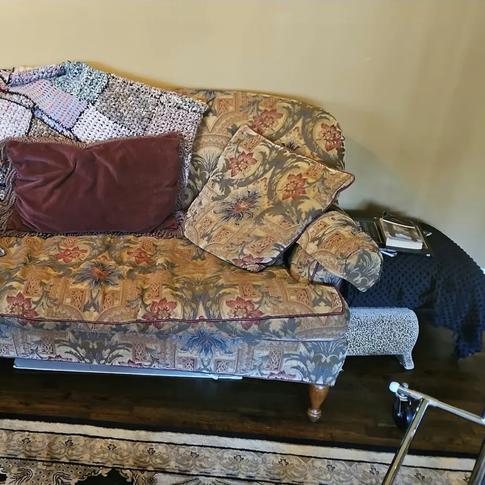 Floral sofa and loveseat before reupholstery
