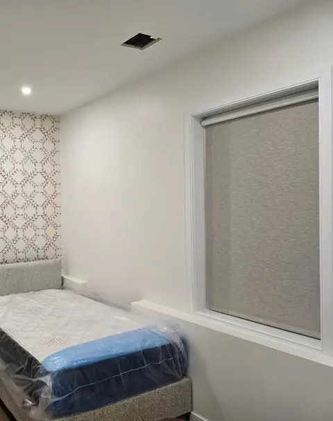 Roller shades, bedroom by Elegant Window Fashion