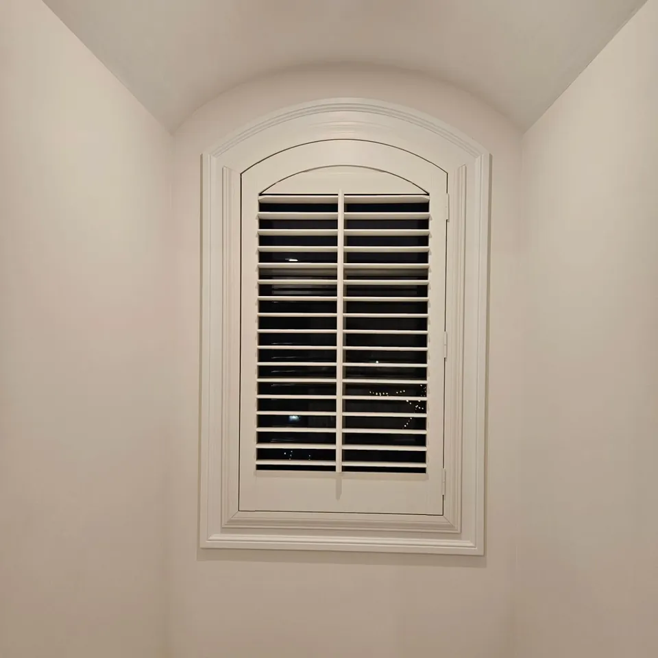 Arched shutter by Elegant Window Fashion