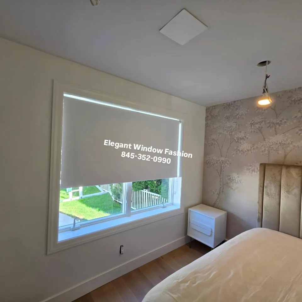 Blackout roller shade, bedroom by Elegant Window Fashion
