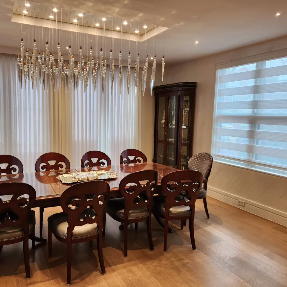 Banded shades and sheers, dining room by Elegant Window Fashion
