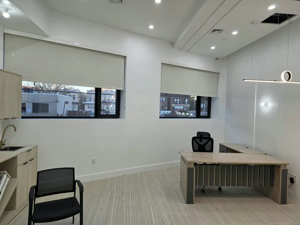 Roller shades, office by Elegant Window Fashion