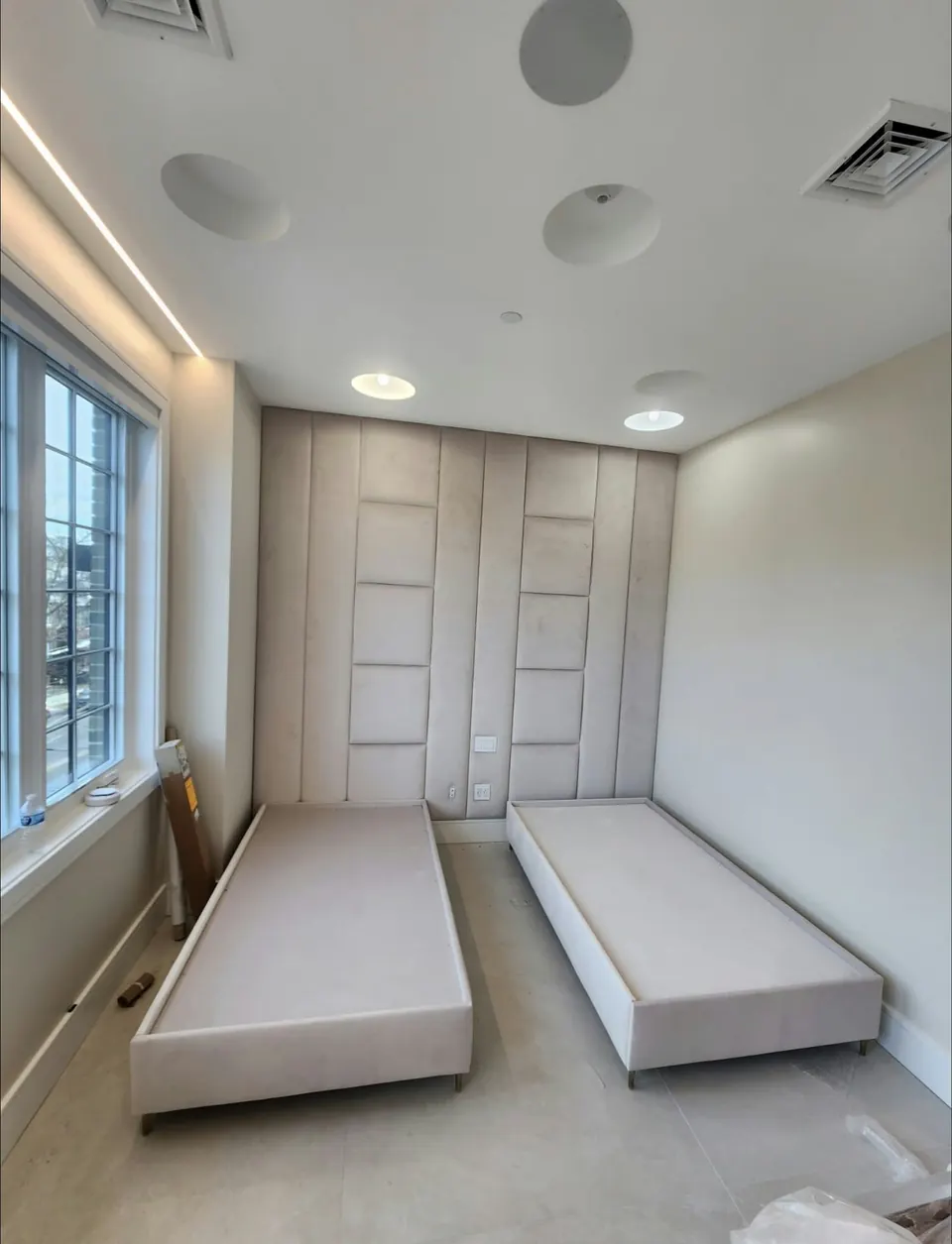 Upholstered wall panels and beds by Elegant Window Fashion