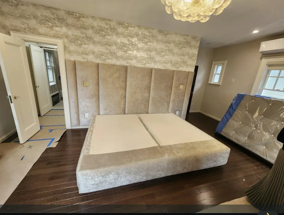 Velvet channel headboard wall by Elegant Window Fashion